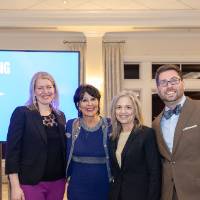 President Mantella standing with panelists Nicole Hemmer, Lisa Perhamus, and Kyle Kooyers